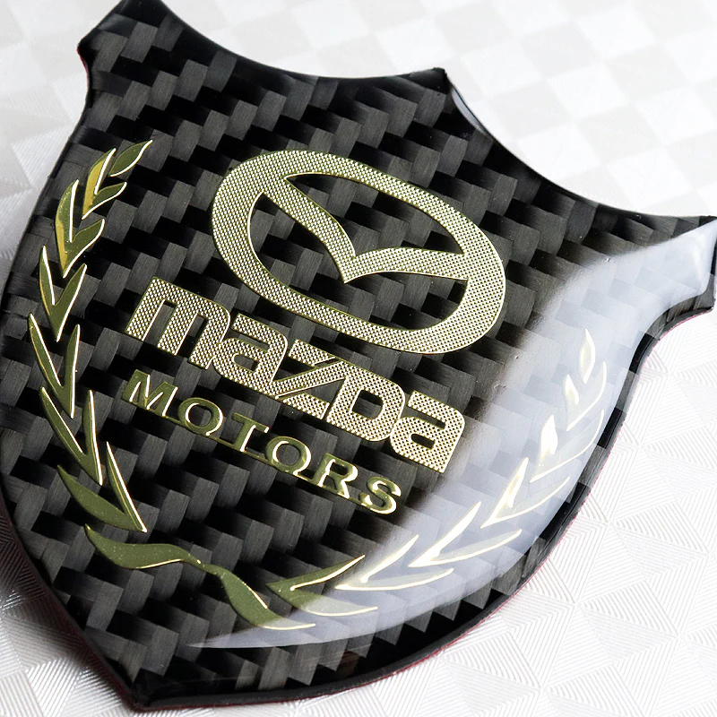 Mazda Gold 3D Carbon Fiber Emblem Sticker x2 - Image 5