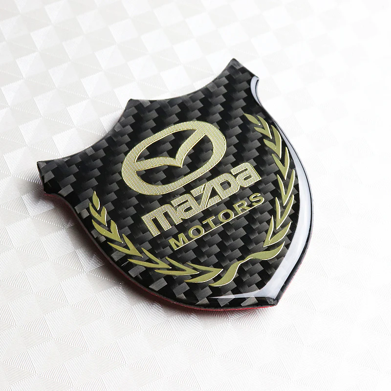 Mazda Gold 3D Carbon Fiber Emblem Sticker x2 - Image 6