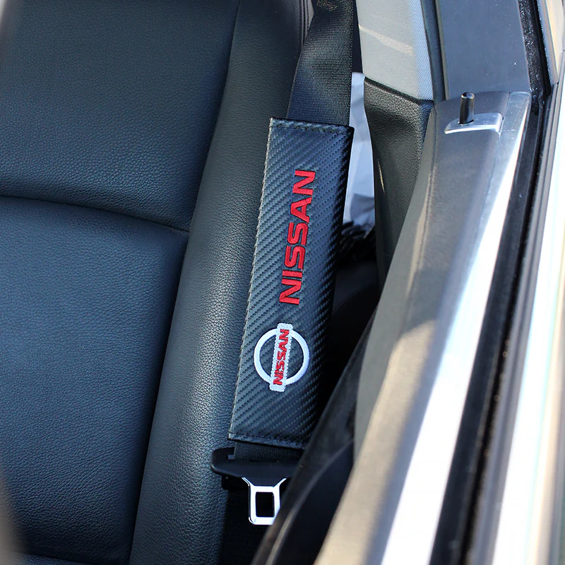 Nissan Set of Carbon Fiber Look Armrest Cushion & Seat Belt Cover - Image 3