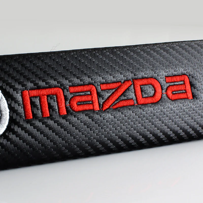 Mazda Black Carbon Fiber Look Seat Belt Cover X2 - Image 5